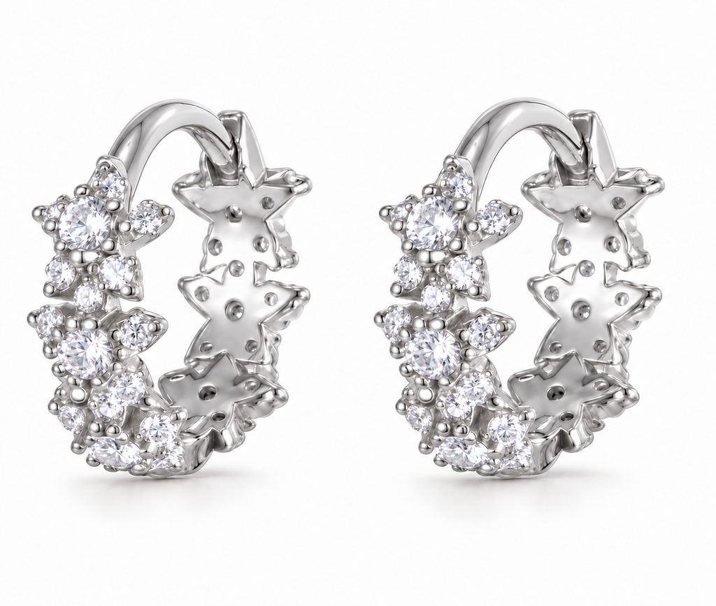 Pair of silver Allstar Huggie earrings on a white background