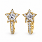 Pair of gold Starlight huggie earrings on a white background