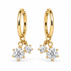 Pair of gold Sweetheart Huggie earrings on a white background