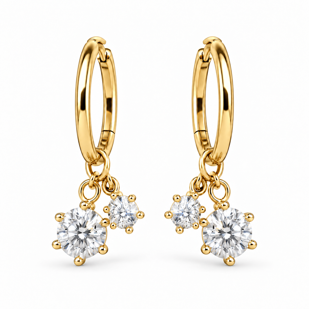Pair of gold Sweetheart Huggie earrings on a white background